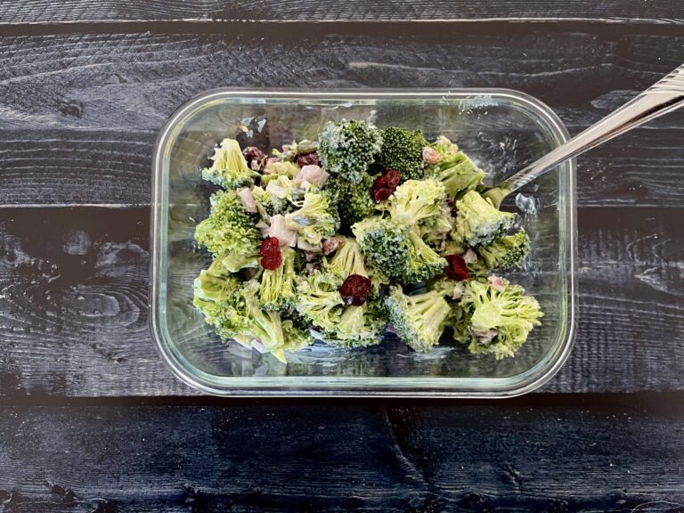 broccoli salad in a glass container.