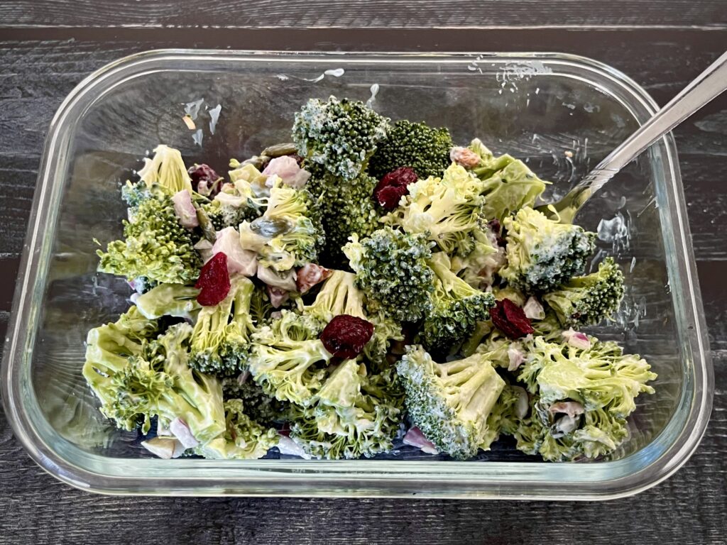 broccoli salad served in a glass container.