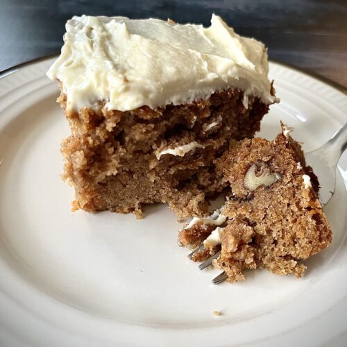 carrot cake bar served on a white plate.