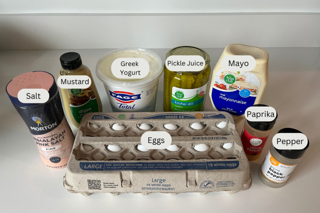 Ingredients for deviled eggs on a counter.