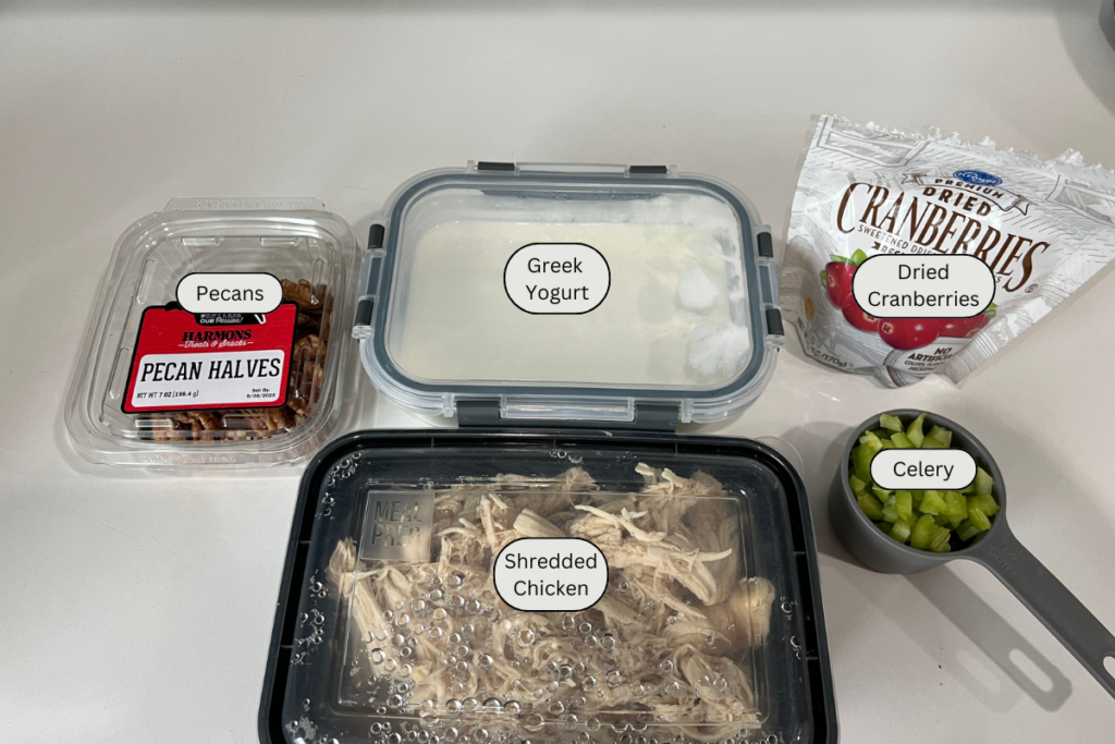 chicken salad ingredients on a counter.