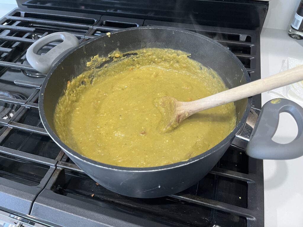 Cooked pea soup in a pot.
