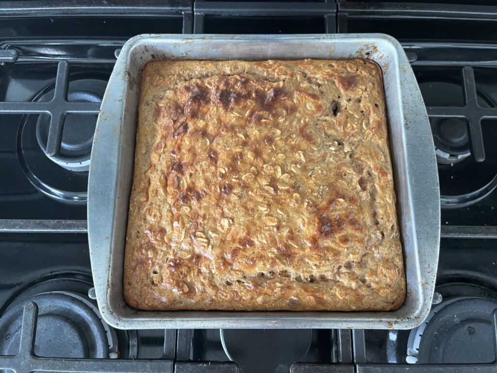 Carrot cake baked oatmeal cooked in a baking dish.