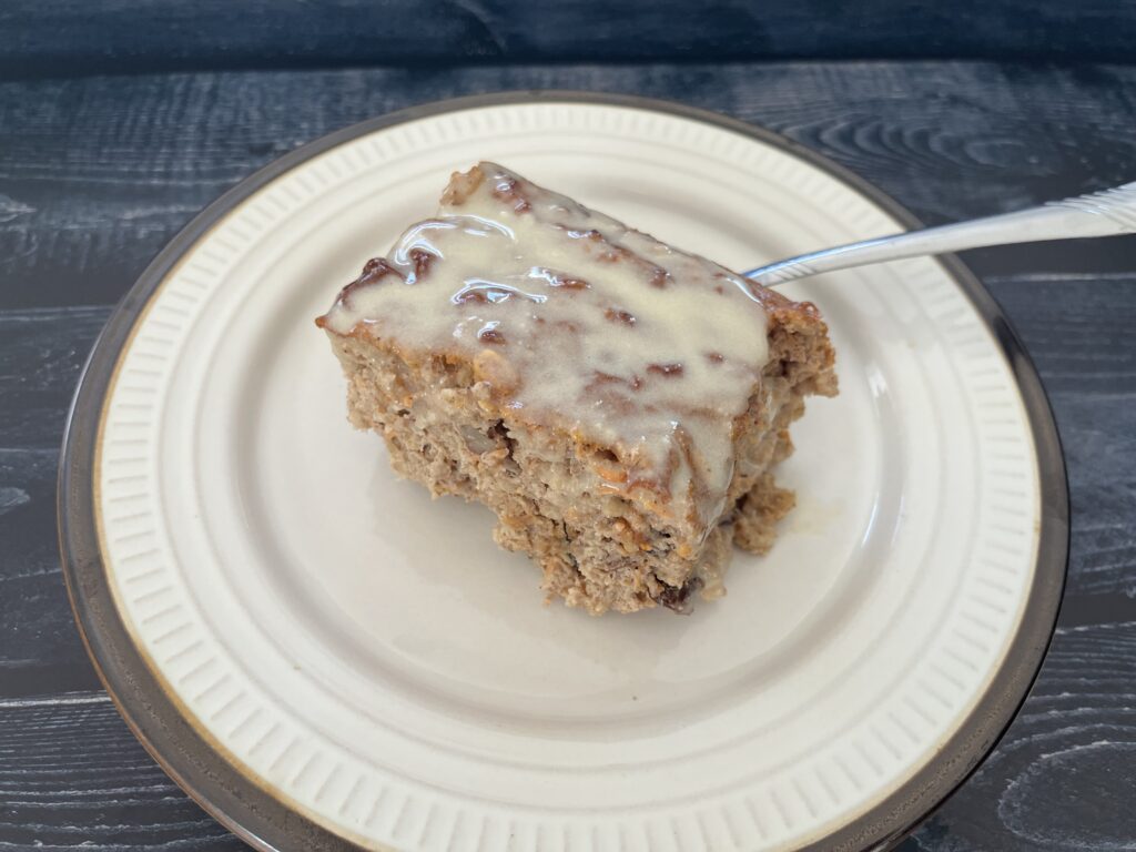 Carrot cake baked oatmeal on a plate.