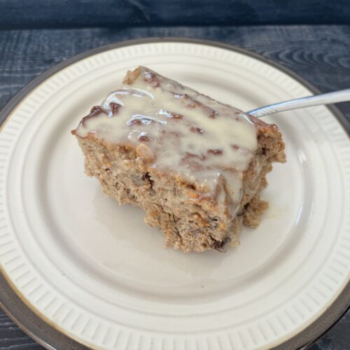 Carrot cake baked oatmeal on a plate.