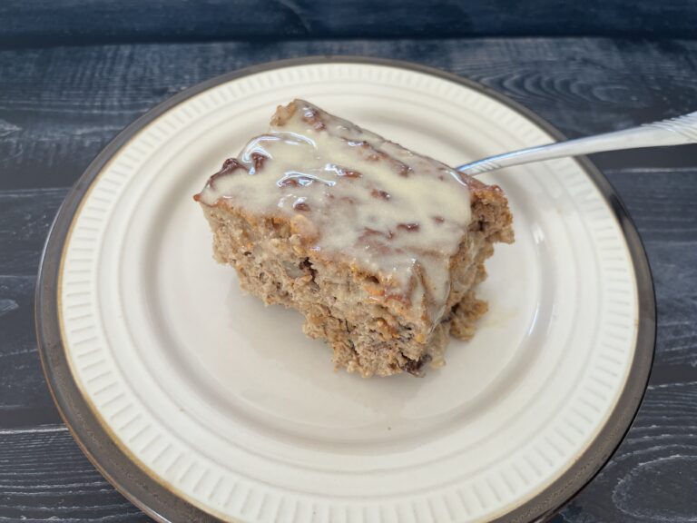 Carrot cake baked oatmeal on a plate.