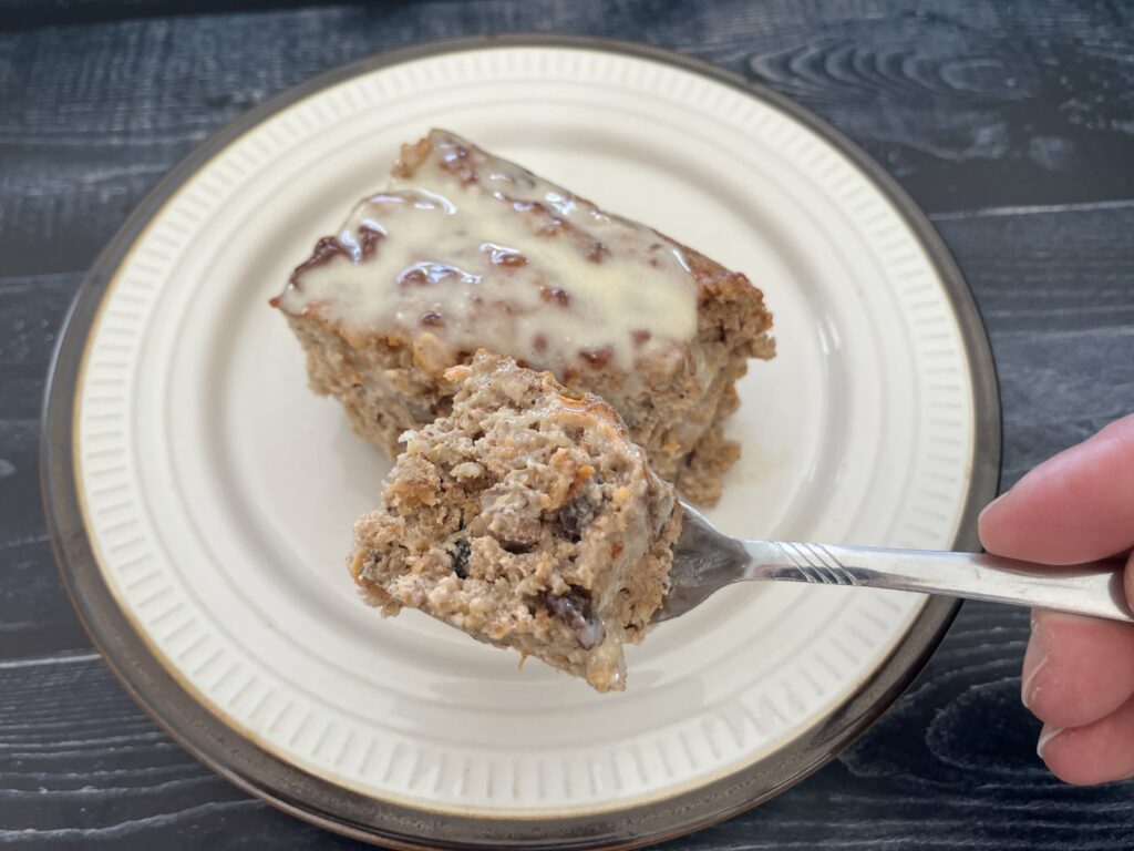 Carrot cake baked oatmeal on a plate.