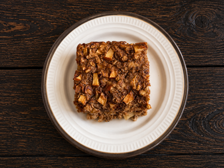 A square of cinnamon apple baked oatmeal on a plate.